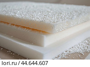 Different density memory foam mattress layers with memory foam flakes. Стоковое AI-изображение, AI-художник Иван Рябоконь / Фотобанк Лори