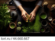 Hands whisking matcha powder in a bowl during a serene tea ceremony. Стоковое AI-изображение, AI-художник Иван Рябоконь / Фотобанк Лори