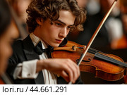 Young violinist in concert performance. Стоковое AI-изображение, AI-художник Иван Рябоконь / Фотобанк Лори