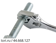 Разводной гаечный ключ на белом фоне. An adjustable wrench on a white background. Стоковое фото, фотограф Татьяна Д / Фотобанк Лори