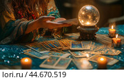 A fortune teller examines tarot cards while surrounded by candles and a crystal ball in a dimly lit room. Стоковое AI-изображение, AI-художник Сергей Толмачёв / Фотобанк Лори