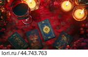 An ornate tarot card reading setup featuring candles and a glass of red wine on a decorative cloth at twilight. Стоковое AI-изображение, AI-художник Сергей Толмачёв / Фотобанк Лори