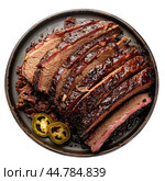 Sliced brisket with jalapenos on a black plate. Стоковое AI-изображение, AI-художник Иван Рябоконь / Фотобанк Лори