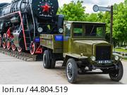 Nazran, Ingushetia, RUSSIA - MAY 12, 2024: Memorial of Memory and Glory. Soviet medium-tonnage truck with a wooden body, one and a half GAZ-AA. The vintage car is made on a frame chassis with springs. History of the creation of trucks in the USSR. Редакционное фото, фотограф Оксана Медведева / Фотобанк Лори