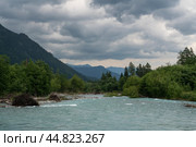 View of the Psysh riverbed in the northern foothills of the Caucasus Mountains near the village of Arkhyz on a sunny summer day, Karachay-Cherkessia, Russia. Стоковое фото, фотограф Ula Ulachka / Фотобанк Лори