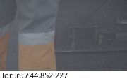 Asphalt laying, road mixture, road equipment, bitumen укладка асфальта, смесь для дороги, дорожная техника, битум. Стоковое видео, видеограф Опока Алексей / Фотобанк Лори