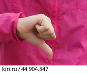Sign language. Thumb down. Стоковое фото, фотограф YuryKara / Фотобанк Лори