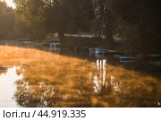 The Golden Ring of Russia, the city of Pereslavl-Zalessky. Fishing boats on the Trubezh River at dawn. Стоковое фото, фотограф Photojuli / Фотобанк Лори