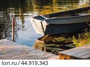 The Golden Ring of Russia, the city of Pereslavl-Zalessky. Fishing boats on the Trubezh River at dawn. Стоковое фото, фотограф Photojuli / Фотобанк Лори