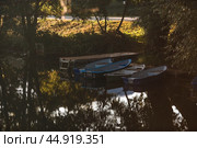 The Golden Ring of Russia, the city of Pereslavl-Zalessky. Fishing boats on the Trubezh River at dawn. Стоковое фото, фотограф Photojuli / Фотобанк Лори