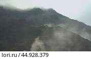 Time-lapse video of morning mist in the Altai mountains. Fog is floating over the slopes of mountain ridges. Стоковое видео, видеограф Сергей Пристяжнюк (Serg Zastavkin) / Фотобанк Лори