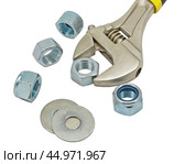 Разводной гаечный ключ на белом фоне. An adjustable wrench on a white background. Стоковое фото, фотограф Татьяна Д / Фотобанк Лори