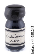 Бутылка с чернилами изолирована на белом фоне с надписью Tuliostro nero - Черный тюльпан. Стоковое фото, фотограф Александр Рыбалка / Фотобанк Лори