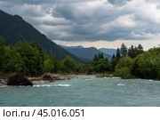 View of the Psysh riverbed in the northern foothills of the Caucasus Mountains near the village of Arkhyz on a sunny summer day, Karachay-Cherkessia, Russia. Стоковое фото, фотограф Ula Ulachka / Фотобанк Лори
