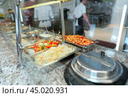 Assorted Dishes Served at a Catered Buffet During a Daytime Event. Стоковое фото, фотограф Сергей Толмачёв / Фотобанк Лори