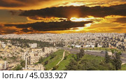 View of the modern houses Amman, Jordan, Middle East. Against the background of the sunset. Стоковое видео, видеограф Владимир Журавлев / Фотобанк Лори