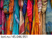 Colorful traditional indian sarees display. Стоковое AI-изображение, AI-художник Иван Рябоконь / Фотобанк Лори