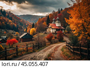 Autumn landscape. A small cozy church in the village. The trees are painted in bright autumn colors. An atmosphere of peace and harmony with nature. Стоковое AI-изображение, AI-художник Photojuli / Фотобанк Лори