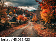 Autumn landscape. A small cozy church in the village. The trees are painted in bright autumn colors. An atmosphere of peace and harmony with nature. Стоковое AI-изображение, AI-художник Photojuli / Фотобанк Лори