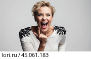 Woman passionately shouting in elegant outfit. Стоковое AI-изображение, AI-художник Андрей Бакусов / Фотобанк Лори