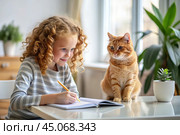 Education and training. A little curly-haired girl is doing her homework. The student does her schoolwork at home. A red-haired cat is sitting next to me. Стоковое AI-изображение, AI-художник Photojuli / Фотобанк Лори