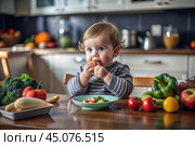 Healthy baby food. The first meal. Feeding the baby. A cute kid tastes fresh vegetables. Стоковое AI-изображение, AI-художник Photojuli / Фотобанк Лори