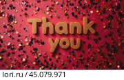 Thank you golden text on pink background. Calligraphy lettering on color glitter confetti template for wedding thank you cards, tags, banners, posters, labels, textiles, invitation and greeting card. Стоковое AI-видео, аниматор Ирина Михайличенко / Фотобанк Лори