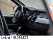 KRASNOYARSK, RUSSIA - June 15, 2024: Black BMW X5 E70. Редакционное фото, фотограф Плотников Дмитрий / Фотобанк Лори