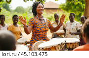 African music teacher conducting drumming workshop outdoors. Стоковое AI-изображение, AI-художник Юрий Поздников / Фотобанк Лори