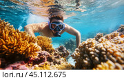Underwater snorkeling adventure in vibrant coral reefs during a sunny day at the ocean. Стоковое AI-изображение, AI-художник Сергей Толмачёв / Фотобанк Лори