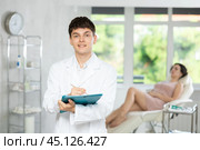 male doctor with folder. Стоковое фото, фотограф Яков Филимонов / Фотобанк Лори