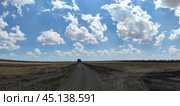 Mowed field under the clouds. Стоковое фото, фотограф Andrew_Swarga / Фотобанк Лори
