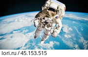 Astronaut wearing space suit performing spacewalk over earth. Стоковое AI-изображение, AI-художник Юрий Поздников / Фотобанк Лори