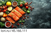 A set of fresh products for cooking. In the center of the frame are pieces of fresh salmon, garnished with herbs and spices. Around the fish are placed fresh vegetables such as cherry tomatoes, lemon, basil, bell pepper, as well as spices, peppercorns and sea salt. The bright colors of the products against the dark texture of the table create contrast and an appetizing look. The photo is ideal for use on culinary websites or in advertising materials dedicated to healthy eating and fresh ingredients. Стоковое AI-изображение, AI-художник Анна Кривицкая / Фотобанк Лори