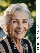 Sophisticated smiling older French woman in the open air. Demeanor reveals a lifetime of experiences and reflections, embodying grace and wisdom. Well-groomed woman 70 years old with grey hair. AI. Стоковое AI-изображение, AI-художник Юлия Петровская / Фотобанк Лори
