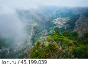 Aerial view of Curral das Freiras village. Miradouro da Eira do Serrado, Madeira, Portugal (2024 год). Стоковое фото, фотограф Дмитрий Рухленко / Фотобанк Лори