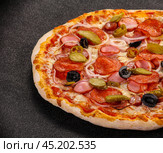 Italian traditional Pizza with sausages. Стоковое фото, фотограф Андрей Старостин / Фотобанк Лори