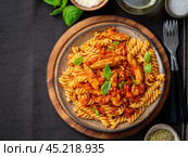 Bolognese pasta. Fusilli with tomato sauce, ground minced beef. Стоковое фото, фотограф Natalia Gdovskaia / Фотобанк Лори
