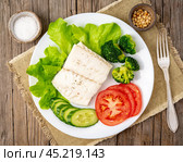 Steamed cod fish. Paleo, keto, fodmap healthy diet with vegetables. Стоковое фото, фотограф Natalia Gdovskaia / Фотобанк Лори