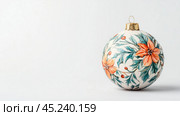 White Christmas ball with red floral pattern highlighted on white background, hand painted, free space for text. Стоковое AI-изображение, AI-художник Елена Зубкова / Фотобанк Лори