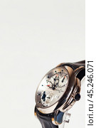 Munich, Swiss - 24 oct 2024: swiss wrist watch Ulysse Nardin SONATA Cathedral, close-up 3d. Silver wristband and bright steel dial, tachymeter, chronograph. Luxury watches concept. Copy ad text space. Редакционное фото, фотограф Aleksandr Golubev / Фотобанк Лори