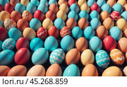 Group of colorful easter eggs laid on blanket. Multi colored easter eggs against bright wool blanket background. Concept of family traditions, Pascha, Resurrection Sunday, Christian cultural holiday. Стоковое AI-изображение, AI-художник Sergey Grishin / Фотобанк Лори