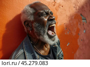 Expression of furious, enraged senior grey bearded afro man with grumpy grimace on his face, mouth opened in shout, ready to argue and swear, Angry black man yelling, screaming on color background. Стоковое AI-изображение, AI-художник Sergey Grishin / Фотобанк Лори