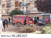 The aftermath of hurricane Dana in Valencia, Spain - Emergency crews working after devastating flood in Valencia, Spain. Стоковое фото, фотограф Данил Руденко / Фотобанк Лори