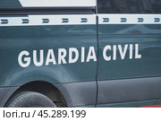 The aftermath of hurricane Dana in Valencia, Spain - Guardia civil vehicle parked after intervening in flood stricken Valencia. Редакционное фото, фотограф Данил Руденко / Фотобанк Лори