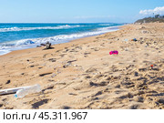 Plastic trash on the seashore. Environmental pollution. Ecological catastrophy. Стоковое фото, фотограф Коханова Наталья / Фотобанк Лори