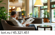 A man reading a newspaper in a modern hotel lobby surrounded by greenery during daylight hours. Стоковое AI-изображение, AI-художник Сергей Толмачёв / Фотобанк Лори