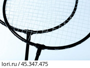 Badminton rackets on white. Стоковое фото, фотограф Сергей Толмачёв / Фотобанк Лори