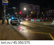 The traffic police squad on the evening street of Young Leninists monitors the order on the road. Russia. Moscow. Редакционное фото, фотограф Ярославский Максим / Фотобанк Лори