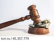 judge gavel and money on brown wooden table concept. Стоковое фото, фотограф Сергей Толмачёв / Фотобанк Лори